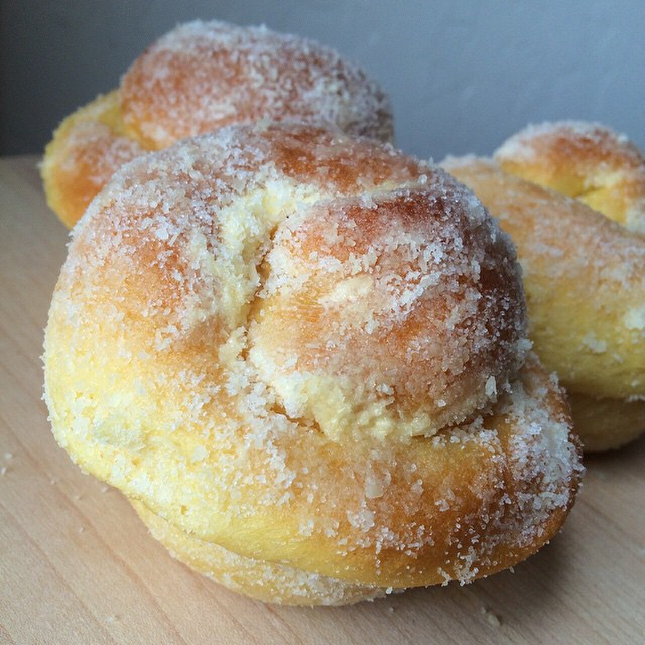 Ensaymada: Filipino Brioche with Butter, Sugar, and Cheese - Bakery-style ensaymada.