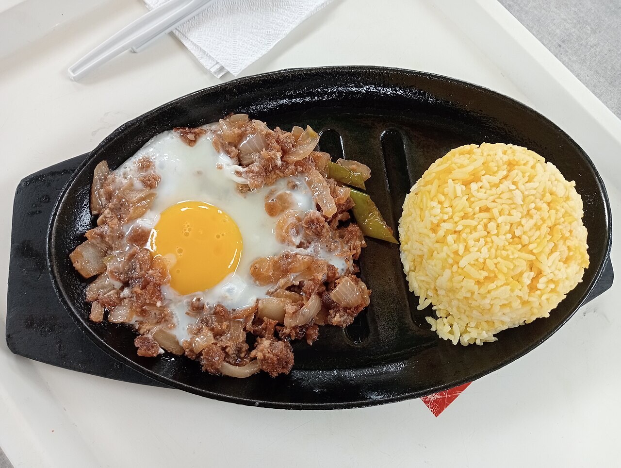 Pork Sisig: Sizzling Filipino Pork with Calamansi - Sizzling pork sisig.