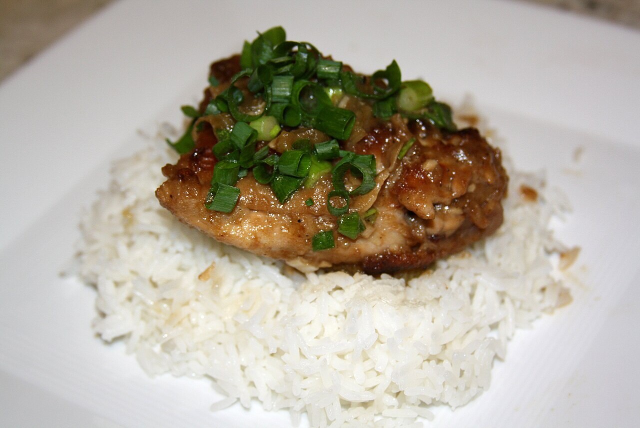 Chicken Adobo: Filipino Soy-Vinegar Chicken for Everyday Rice Bowls - Filipino chicken adobo plated for serving.