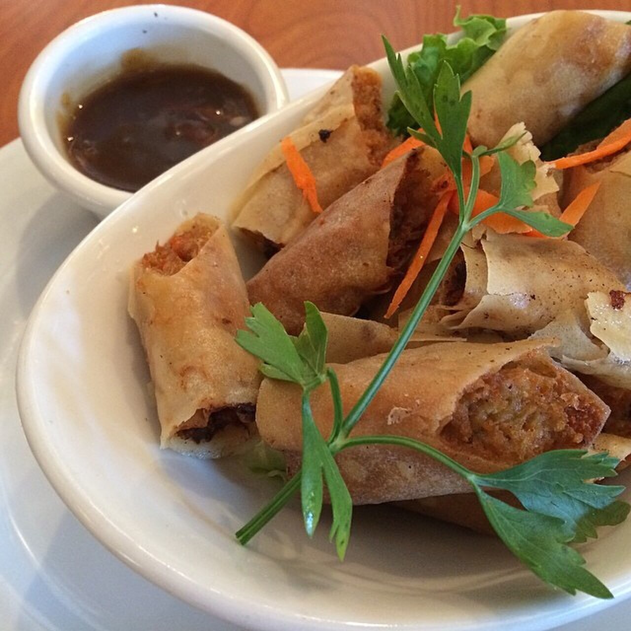 Lumpiang Shanghai: Crispy Filipino Pork Spring Rolls - Lumpiang Shanghai with a crisp wrapper.