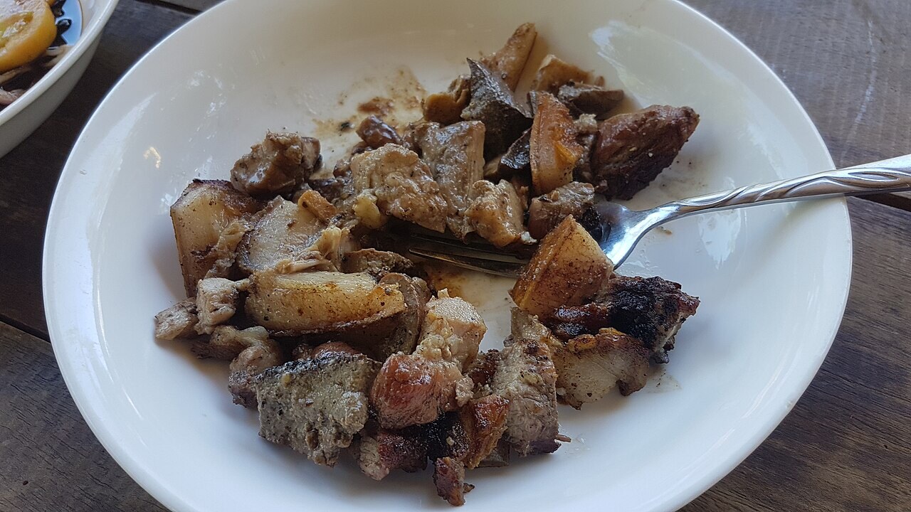 Inihaw na Liempo: Filipino Grilled Pork Belly - Sinugba (Inihaw na liempo) - grilled pork belly, Philippines with dipping sauce.