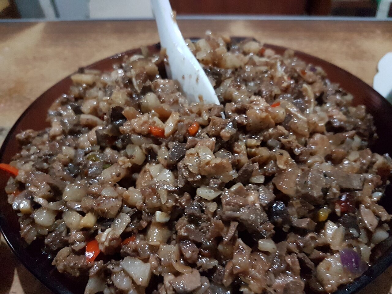 Pork Sisig: Sizzling Filipino Pork with Calamansi - Philippine sisig.