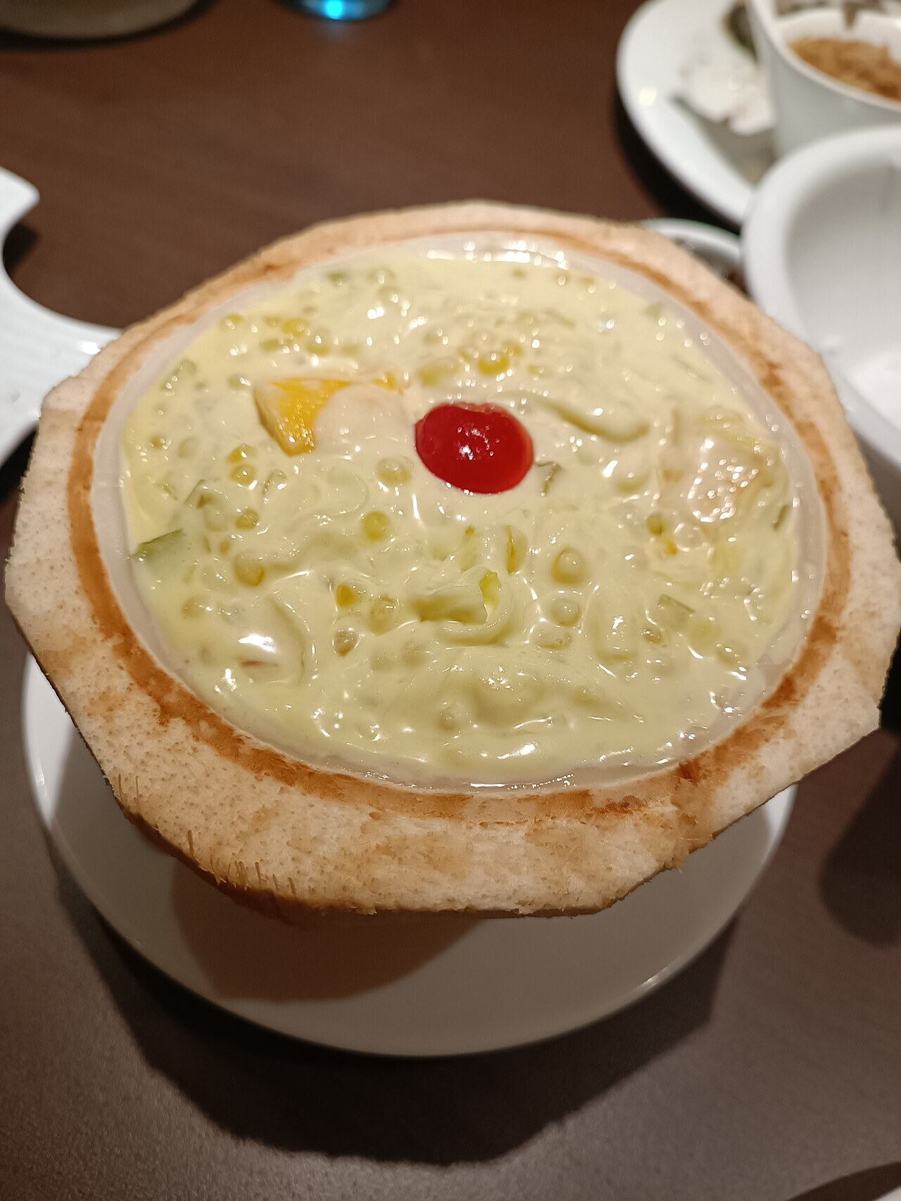 Buko Pandan: Filipino Coconut Pandan Dessert - Buko pandan in a serving bowl.