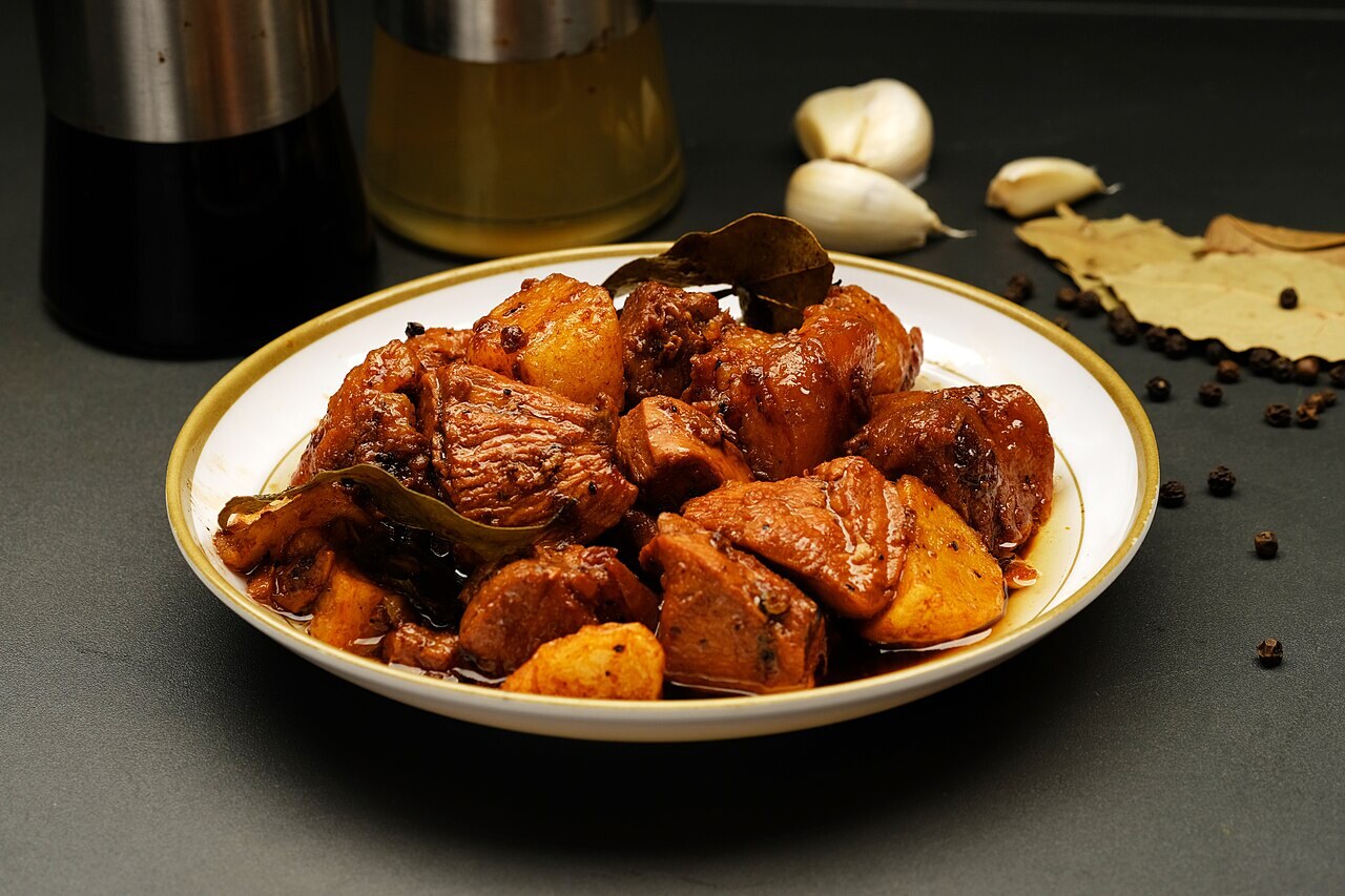 Adobo Fried Rice: Garlic Rice with Soy-Vinegar Chicken - Pork adobo as a flavor reference for fried rice.