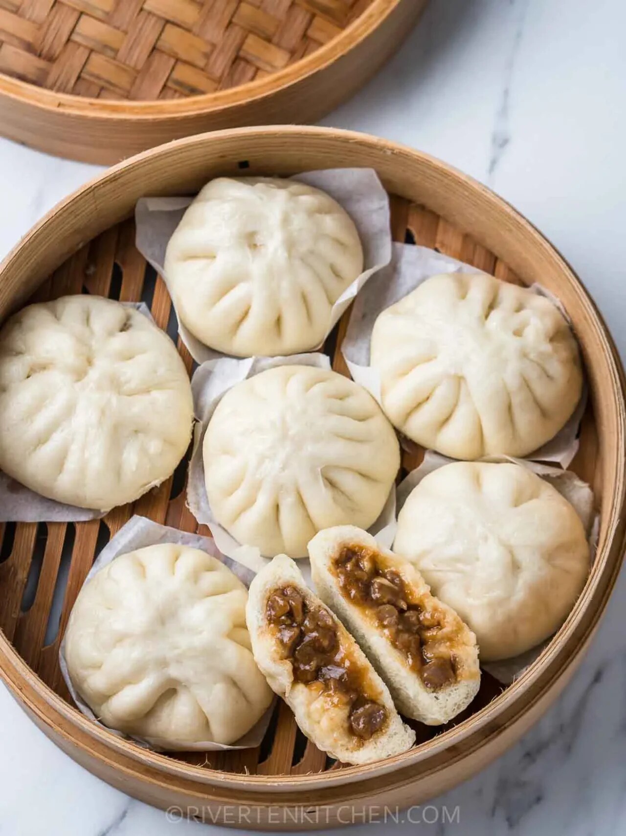 Siopao Asado: Steamed Filipino Buns with Sweet Pork Filling - Siopao asado is Filipino's own adaptation of Chinese char siu bao (cha siu bao). Instead of using char siu pork, thes.