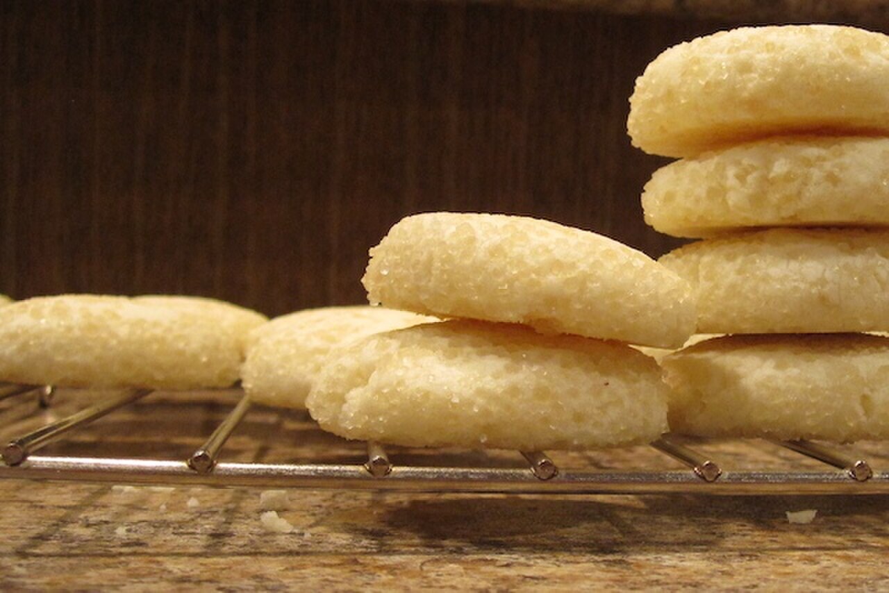 Calamansi Shortbread Cookies - Shortbread cookies stacked on a rack.