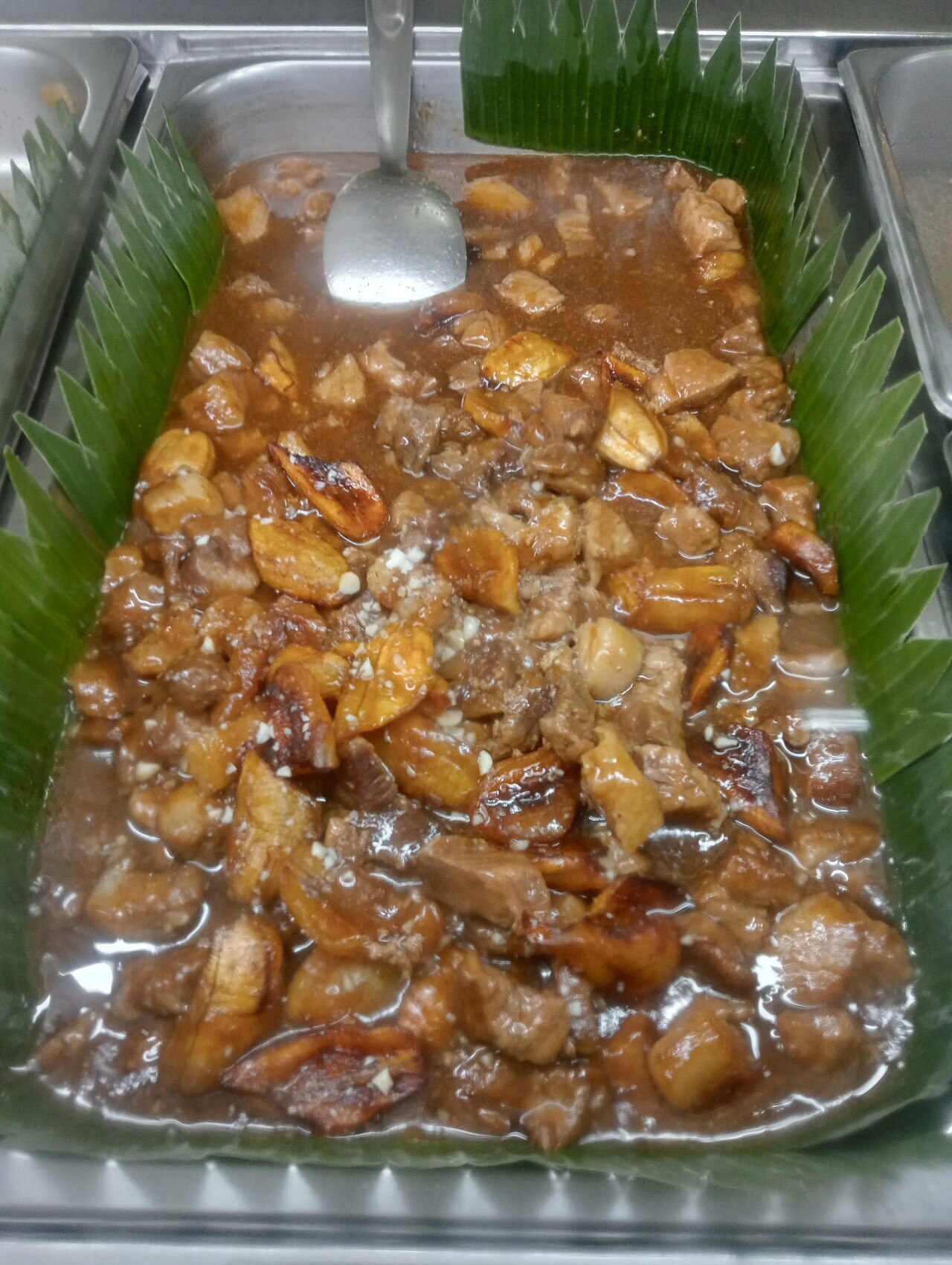 Humba: Visayan Braised Pork with Pineapple and Black Beans - Pork humba served in a tray.