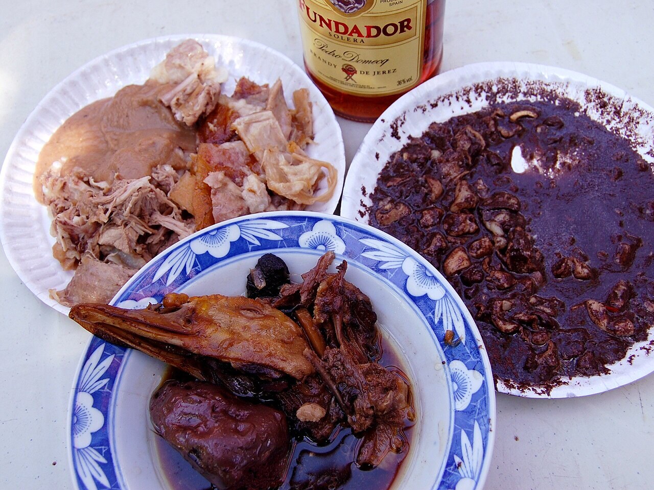 Dinuguan with Puto: Filipino Savory Pork Blood Stew - Adobong bibe (duck adobo), dinuguan, lechon (Philippines).