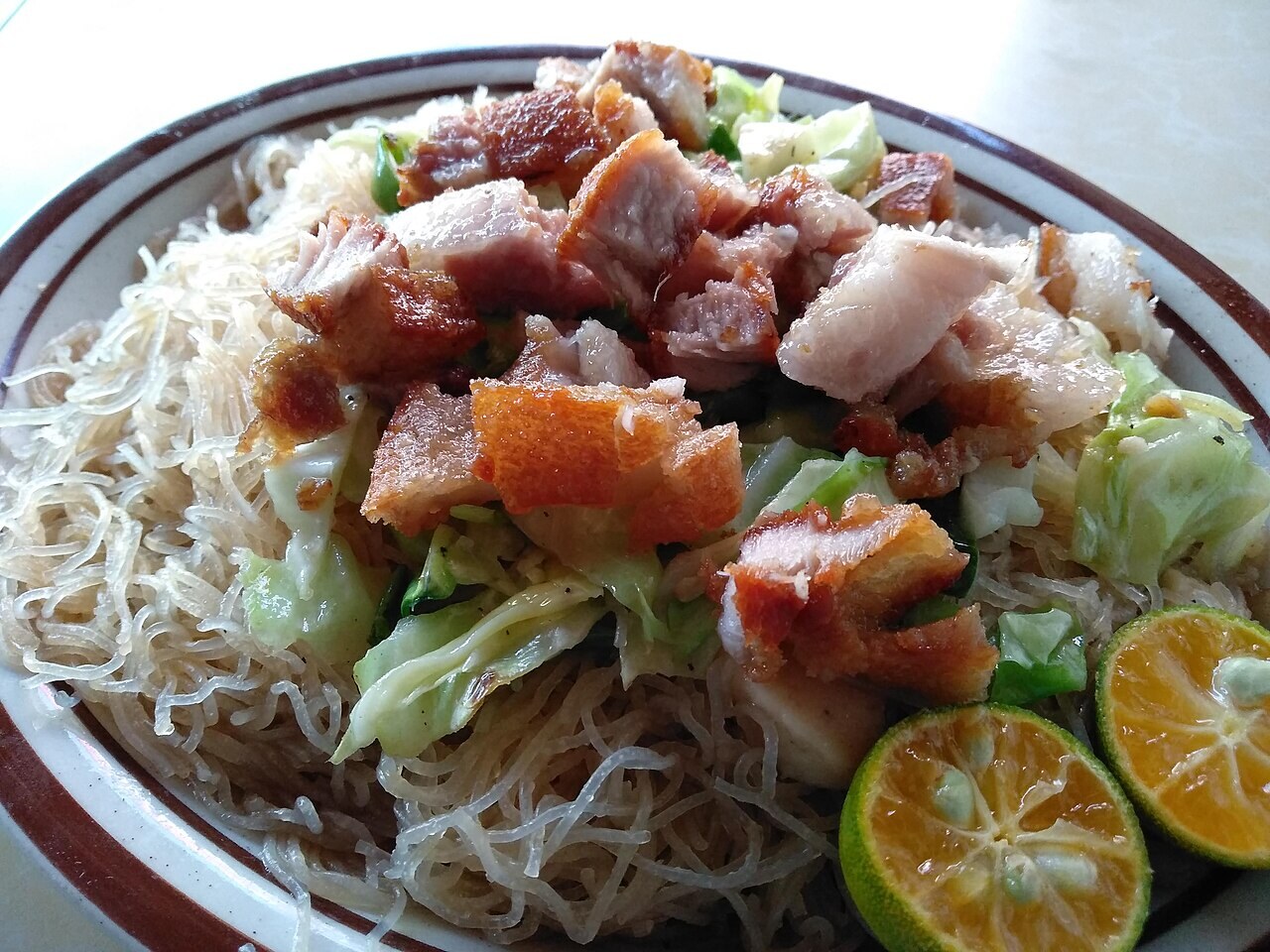 Pancit Bihon: Filipino Rice Noodles for Birthdays and Weeknights - Pancit bihon with calamansi.
