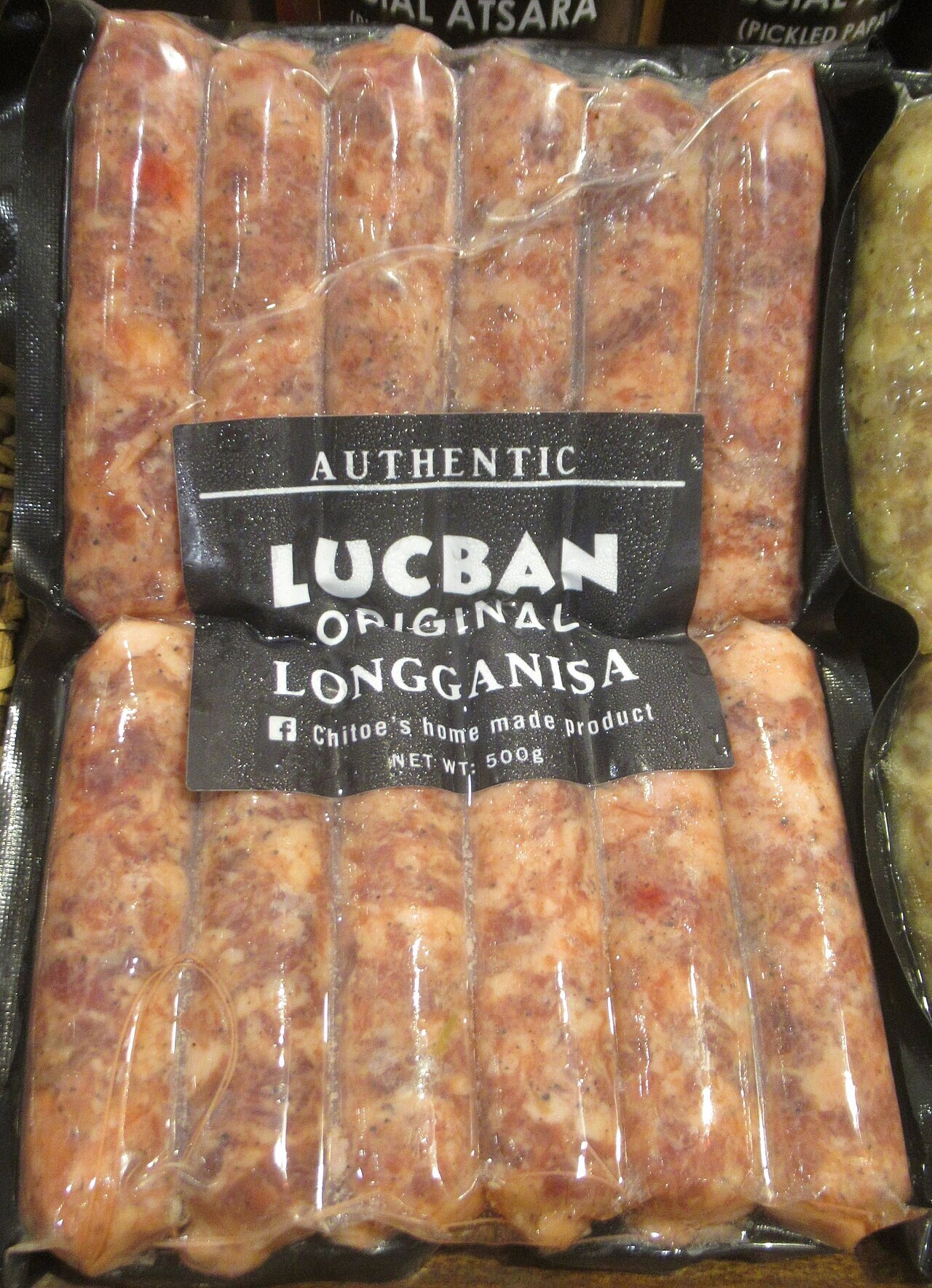 Longganisa Pasta with Garlic, Tomatoes, and Greens - Lucban garlic longganisa for a garlic-forward pasta.