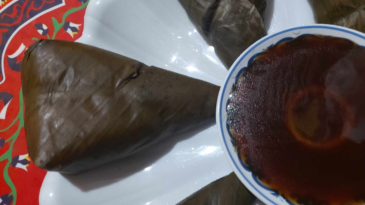 Suman Malagkit: Banana-Leaf Sticky Rice Bundles - SUMAN is usually salty so it need katiba sweet sugar cooked with cocomilk for different flavor.