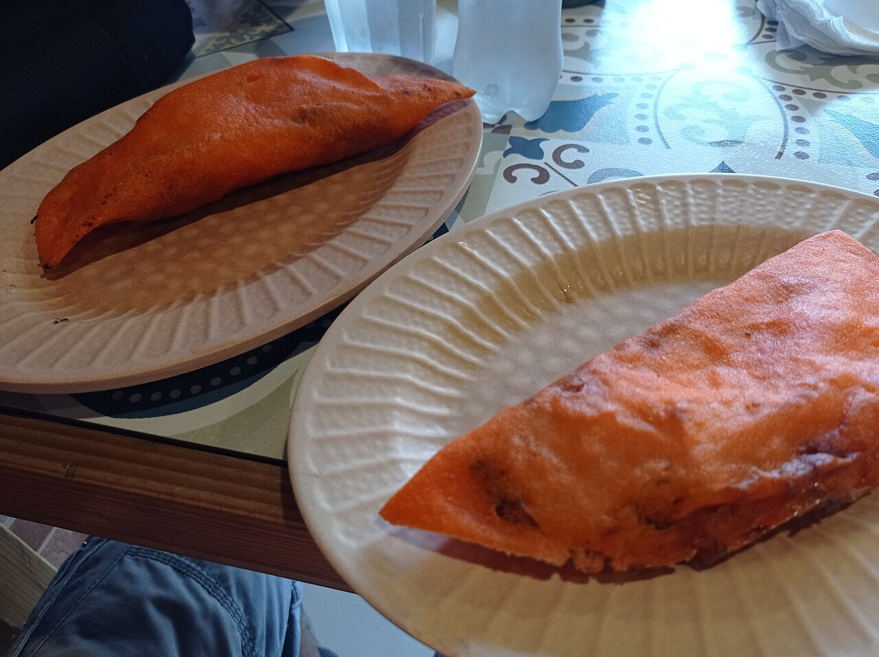 Ilocos Empanada: Crispy Orange Empanada with Longganisa and Egg - Empanada from Ilocos.