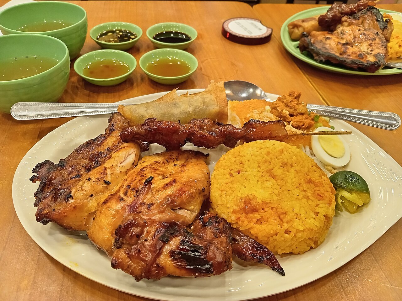 Chicken Inasal: Filipino Grilled Chicken with Annatto Oil - Chicken inasal meal with rice.