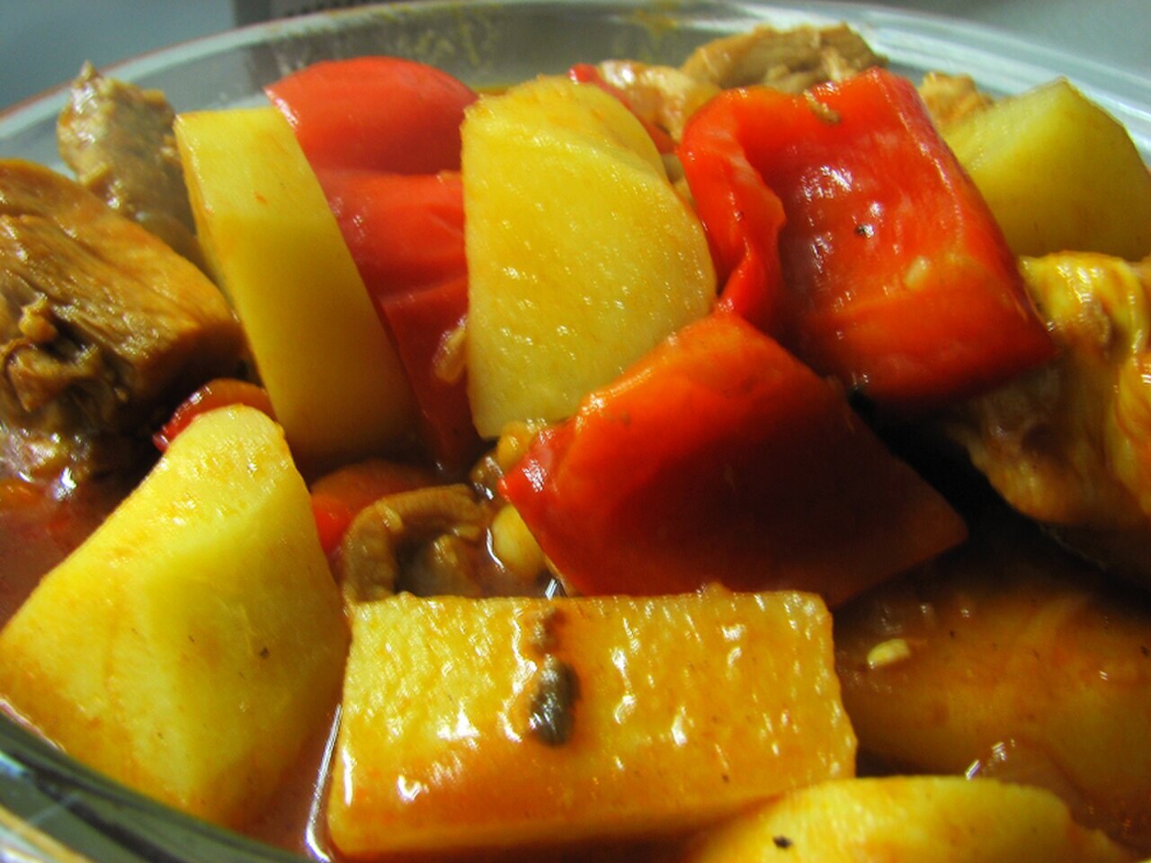 Filipino Tomato Stew Guide: Menudo, Afritada, Mechado, and Kaldereta - Chicken afritada with pineapple.