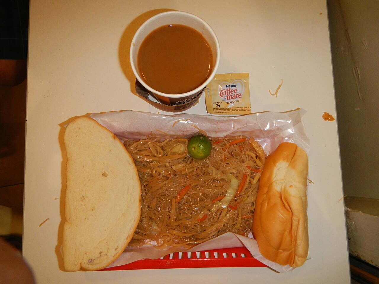 Pancit Miki Bihon: Mixed Egg and Rice Noodles - Pancit miki bihon, bread and coffee.