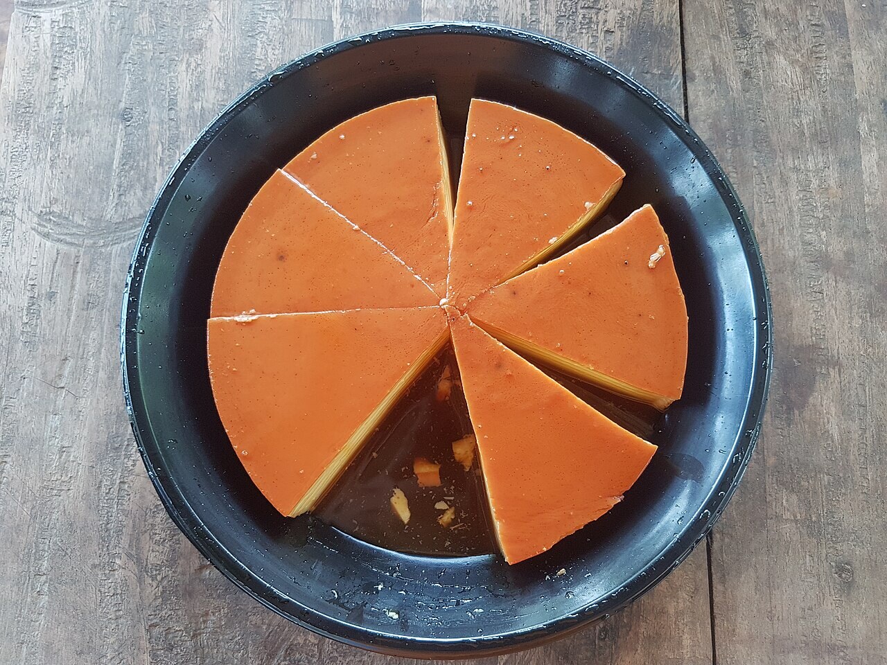 Leche Flan: Silky Filipino Caramel Custard - Leche flan served with caramel.