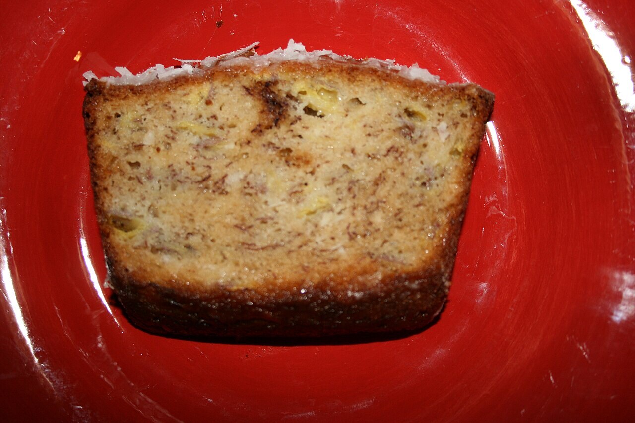 Coconut Calamansi Banana Bread with Ube Swirl - Coconut-lime banana bread slice showing the loaf style for this calamansi-ube variation.