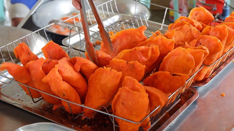 Ilocos Empanada: Crispy Orange Empanada with Longganisa and Egg recipe