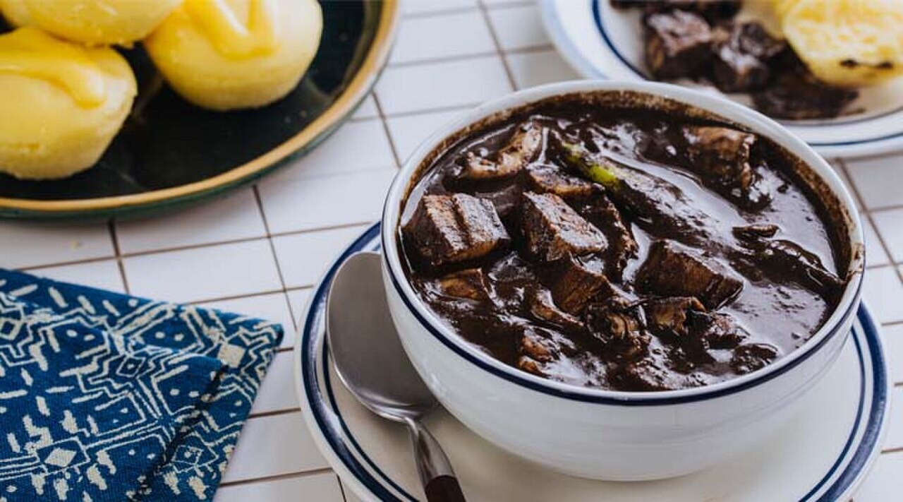 Dinuguan with Puto: Filipino Savory Pork Blood Stew - Dinuguan served with Puto (Filipino rice cake) for lunch.
