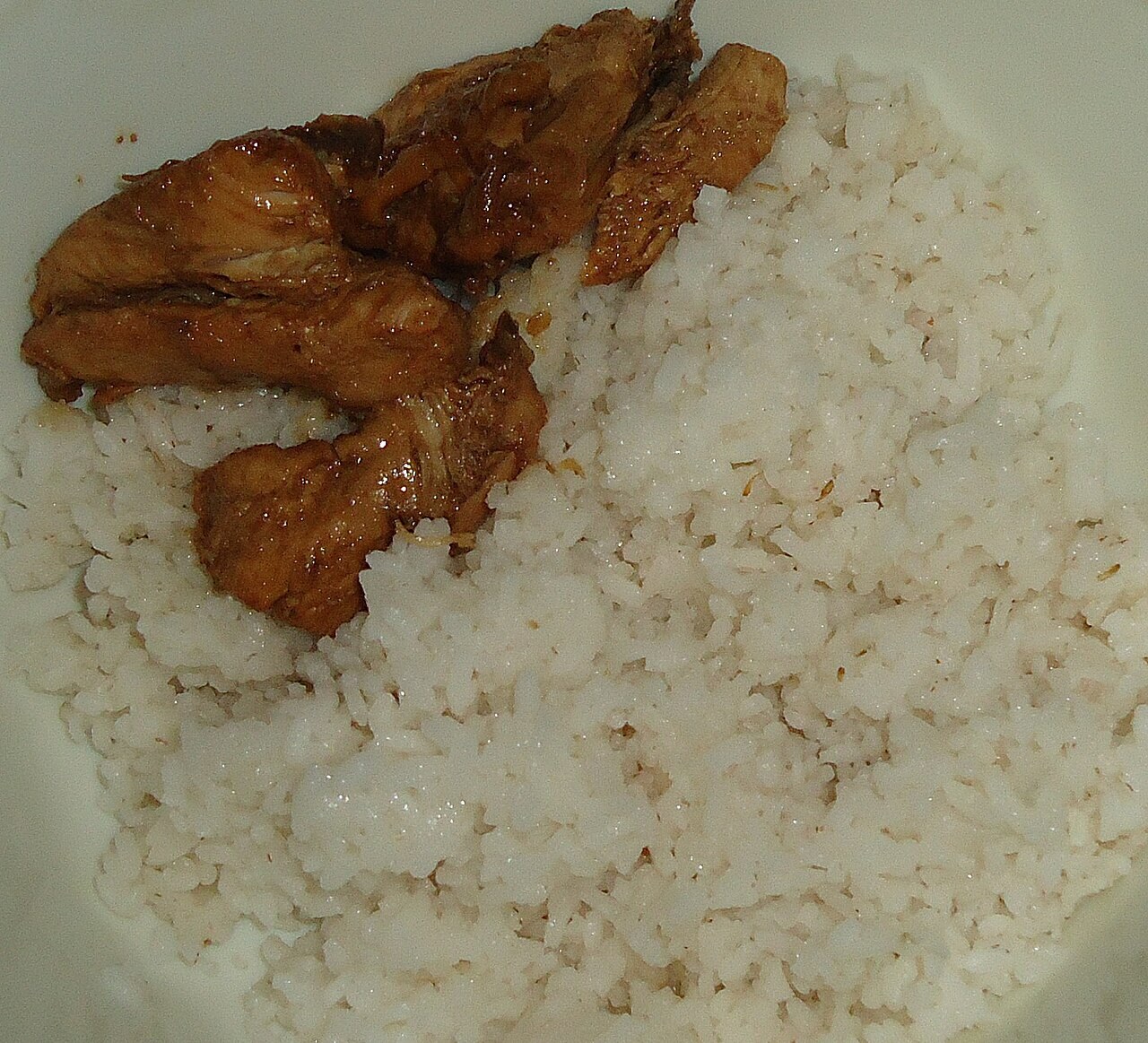 Crispy Chicken Adobo Flakes - Chicken adobo over rice.