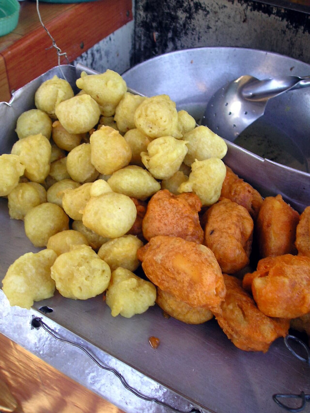 Kwek-Kwek: Orange-Battered Quail Eggs with Sweet-Spicy Sauce - Kwek-kwek (right with orange brown color) is boiled quail or chicken egg coated in batter then fried. Olympus Camedia.