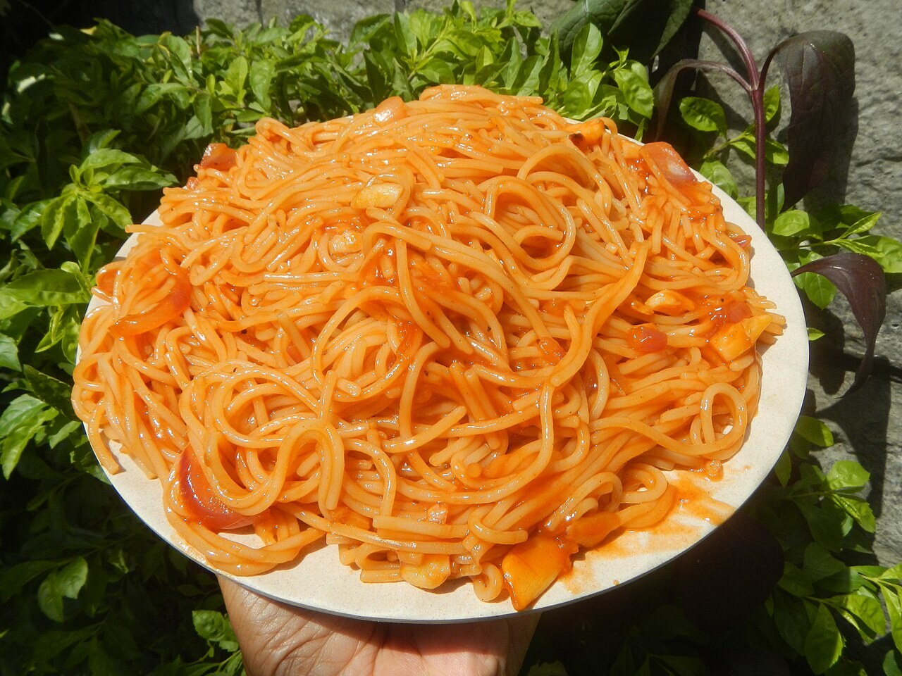 Filipino Spaghetti: Sweet-Savory Party Noodles - Filipino spaghetti plate for a sweet-savory noodle article.