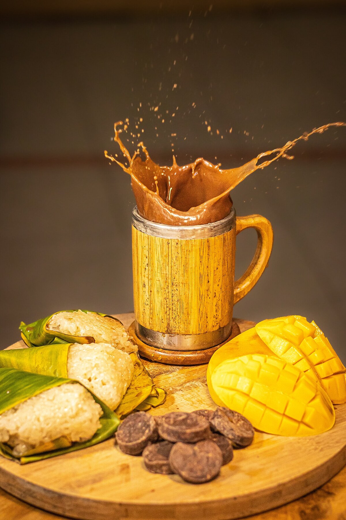 Puto Maya with Sikwate: Cebuano Sticky Rice and Hot Chocolate - Puto Maya refers to steamed glutinous rice cakes often infused with coconut milk, giving them a slightly sweet and ar.