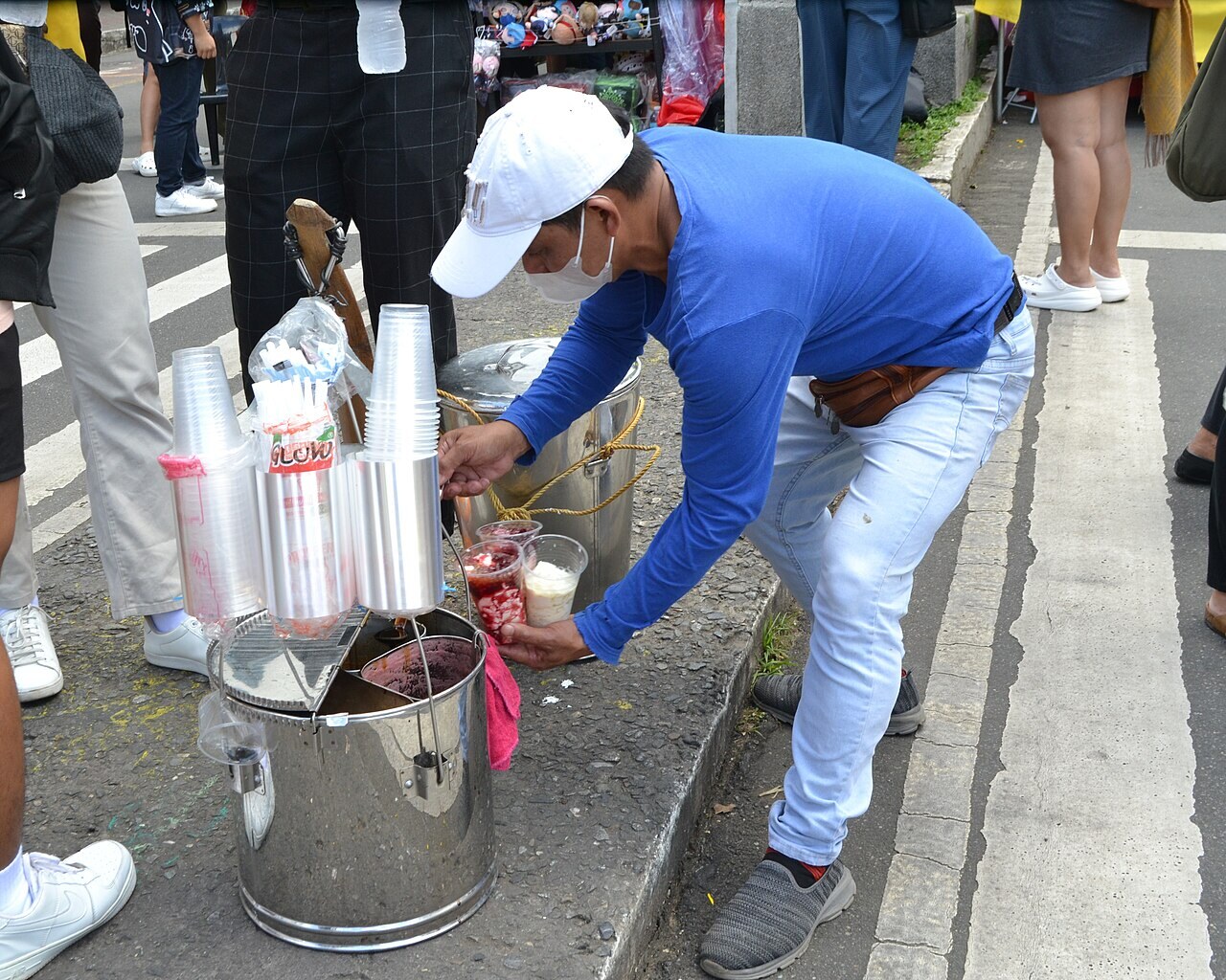 Taho: Warm Filipino Silken Tofu with Arnibal and Sago - Taho vendor in Baguio.