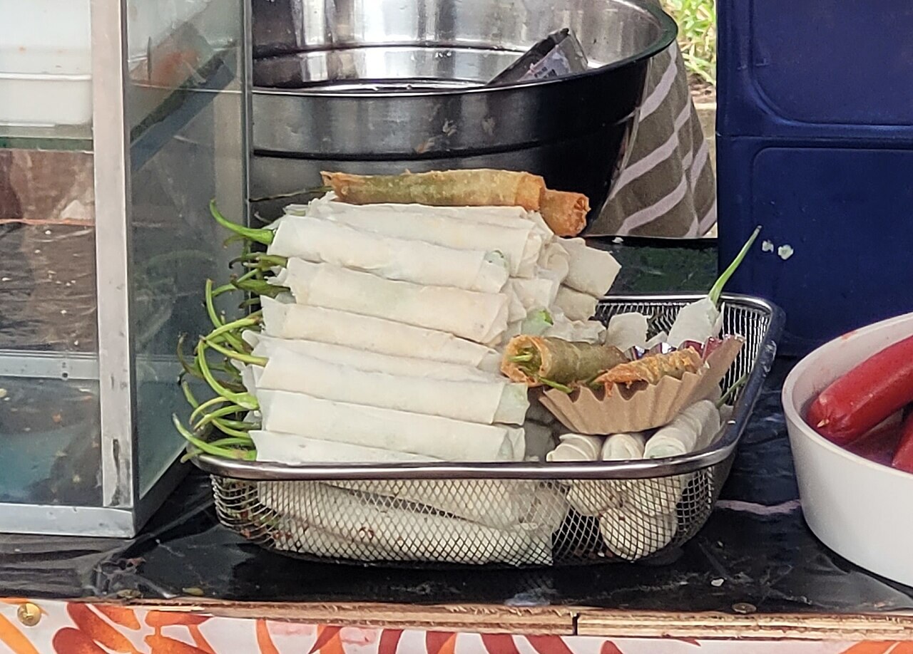 Dynamite Lumpia: Cheese-Stuffed Chile Spring Rolls - Dynamite lumpia (Dinamita) at a street food stall (Philippines).