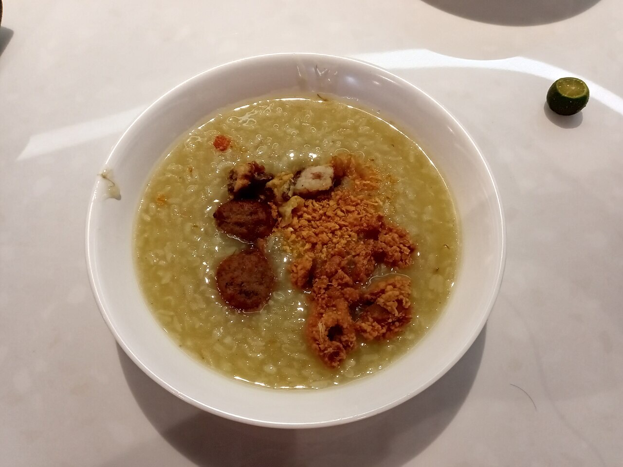 Arroz Caldo: Filipino Ginger Chicken Rice Porridge - Arroz caldo with toppings.