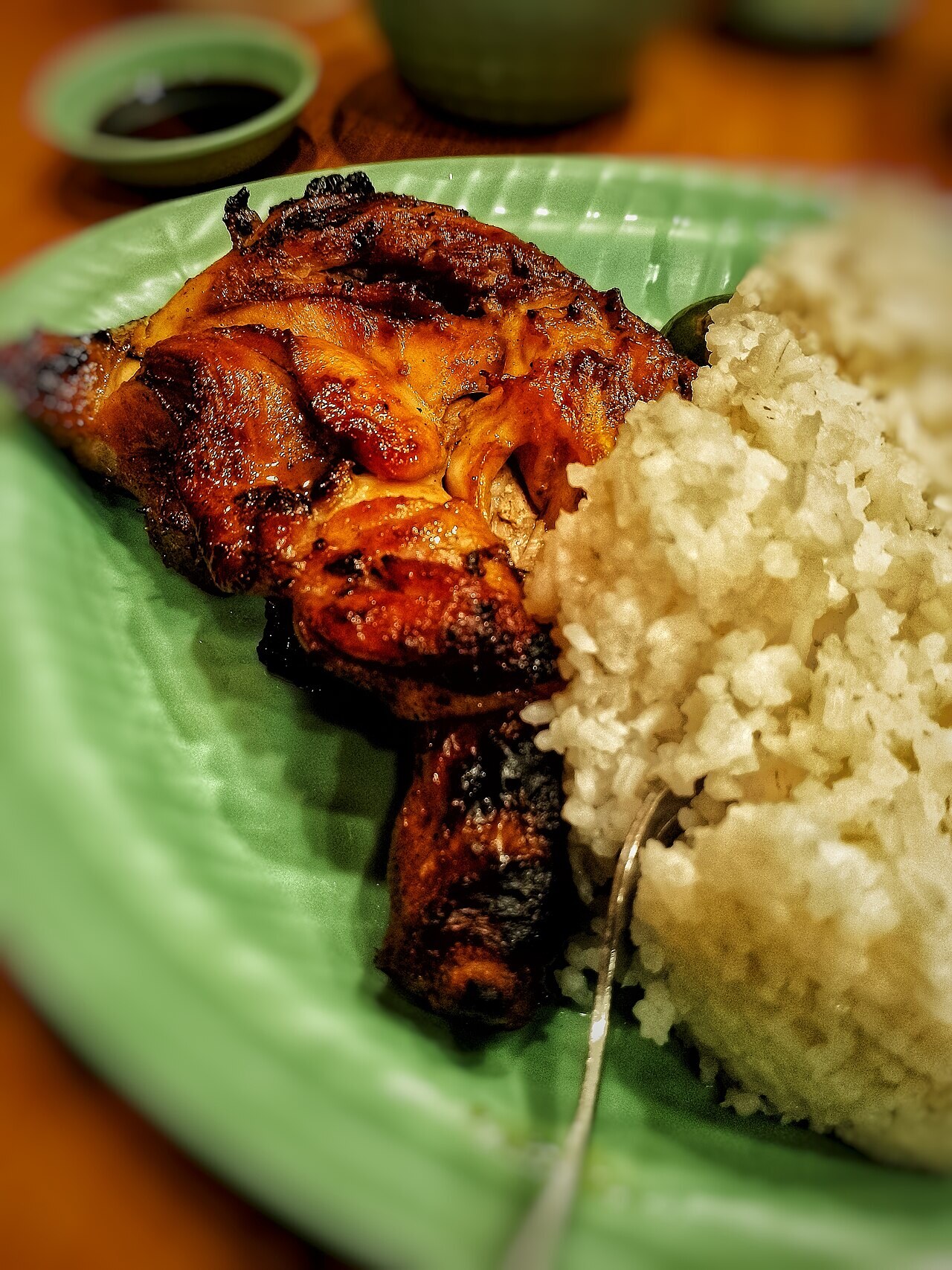Chicken Inasal: Filipino Grilled Chicken with Annatto Oil - Chicken inasal served with rice.